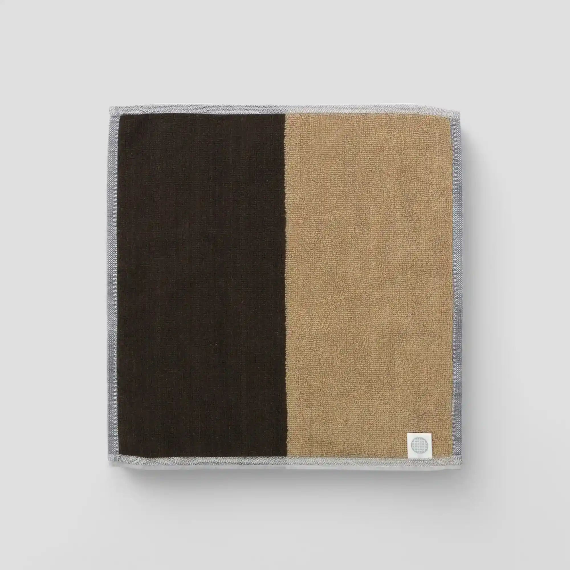 A collection of "tonari" Imabari towel in brown and beige backside with Iori&