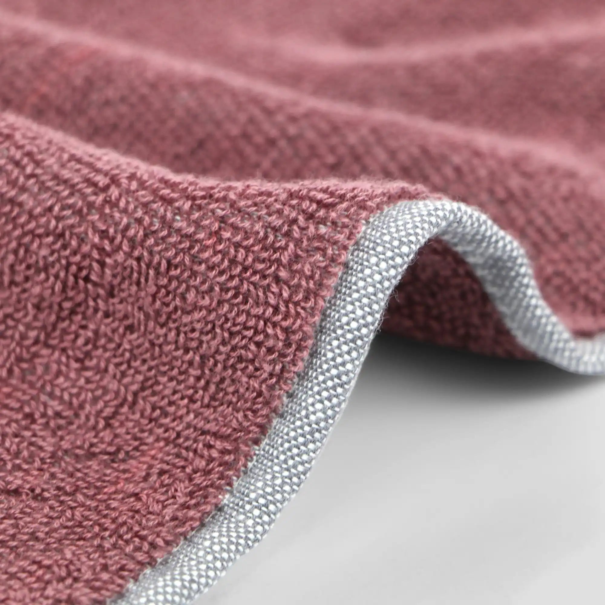Close-up of a side of  pink Imabari towel 