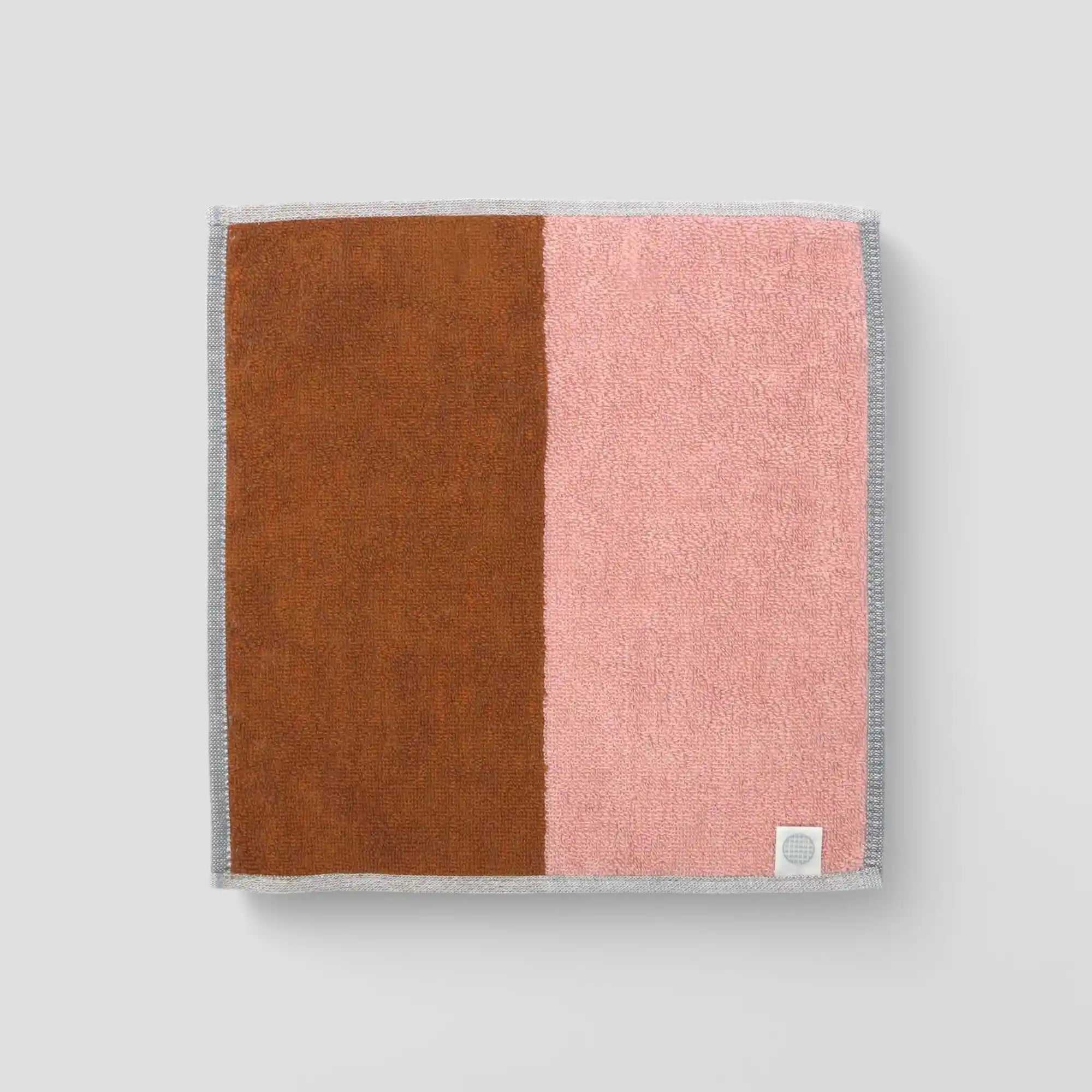 A collection of "tonari" Imabari towel in brown and pink backside with Iori&