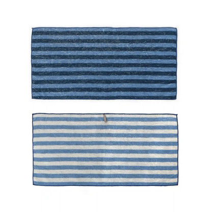 Two striped Imabari towels, one blue and white, the other navy and blue, on a white background.