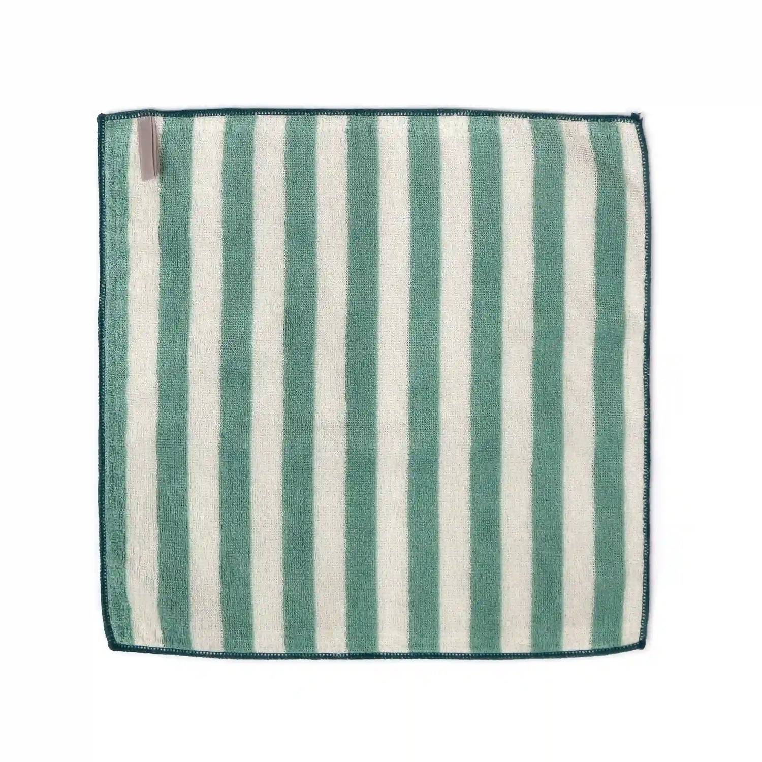 Striped green and white Imabari towel on a white background
