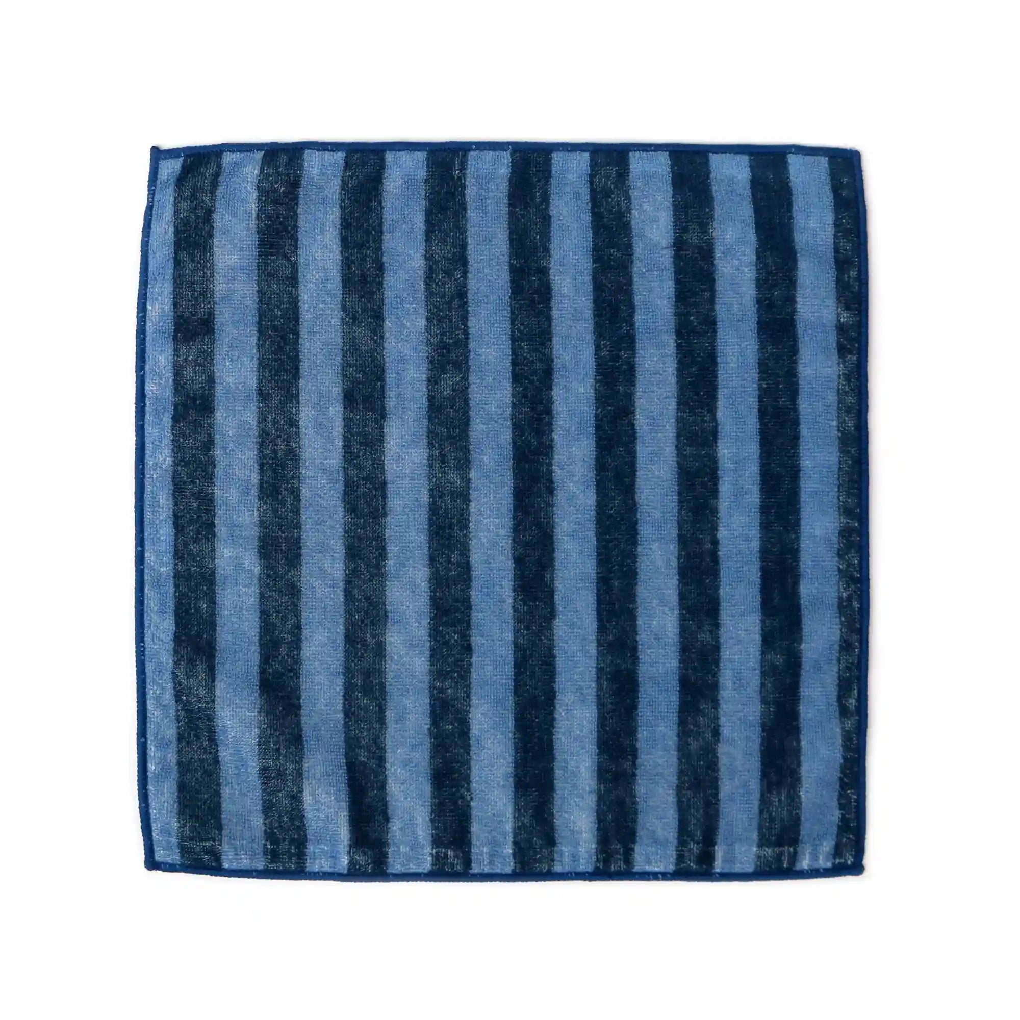 Blue striped Imabari towel on a white background
