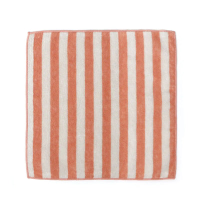Striped Imabari towel with pink and white vertical stripes on a white background
